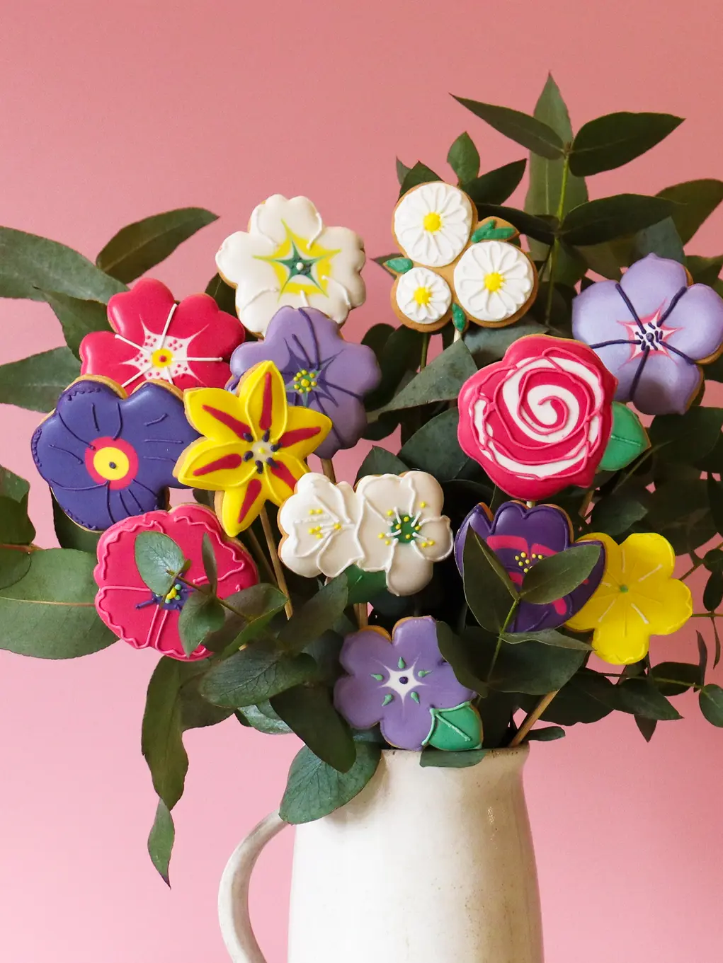 Floral biscuits in a white vase