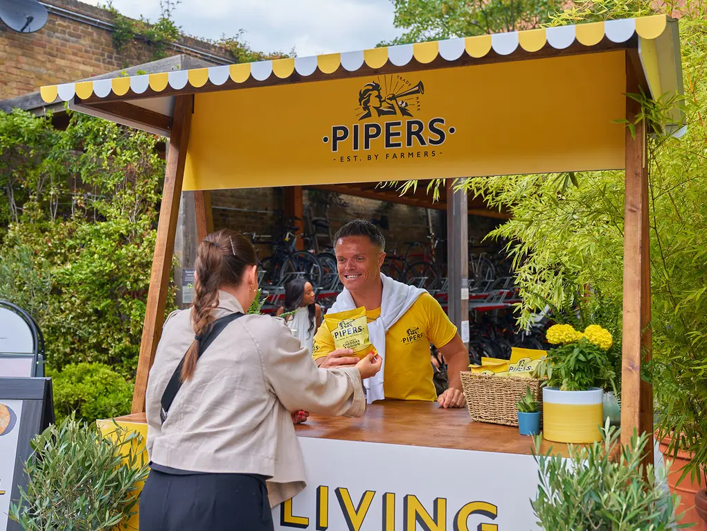 A stand offering Pipers crisps